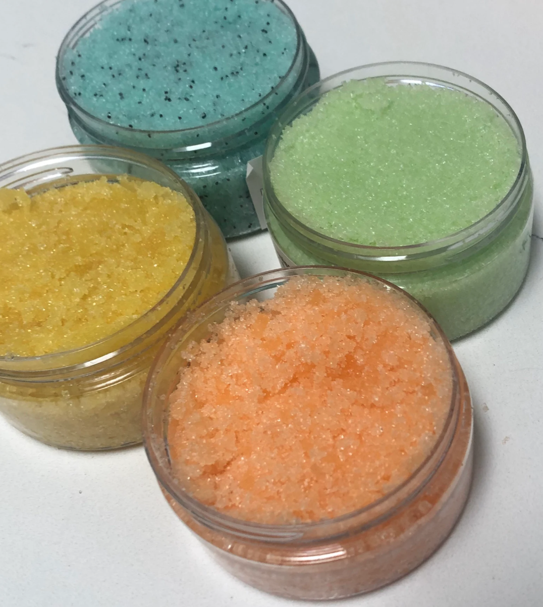 Colorful handmade sugar scrubs in jars